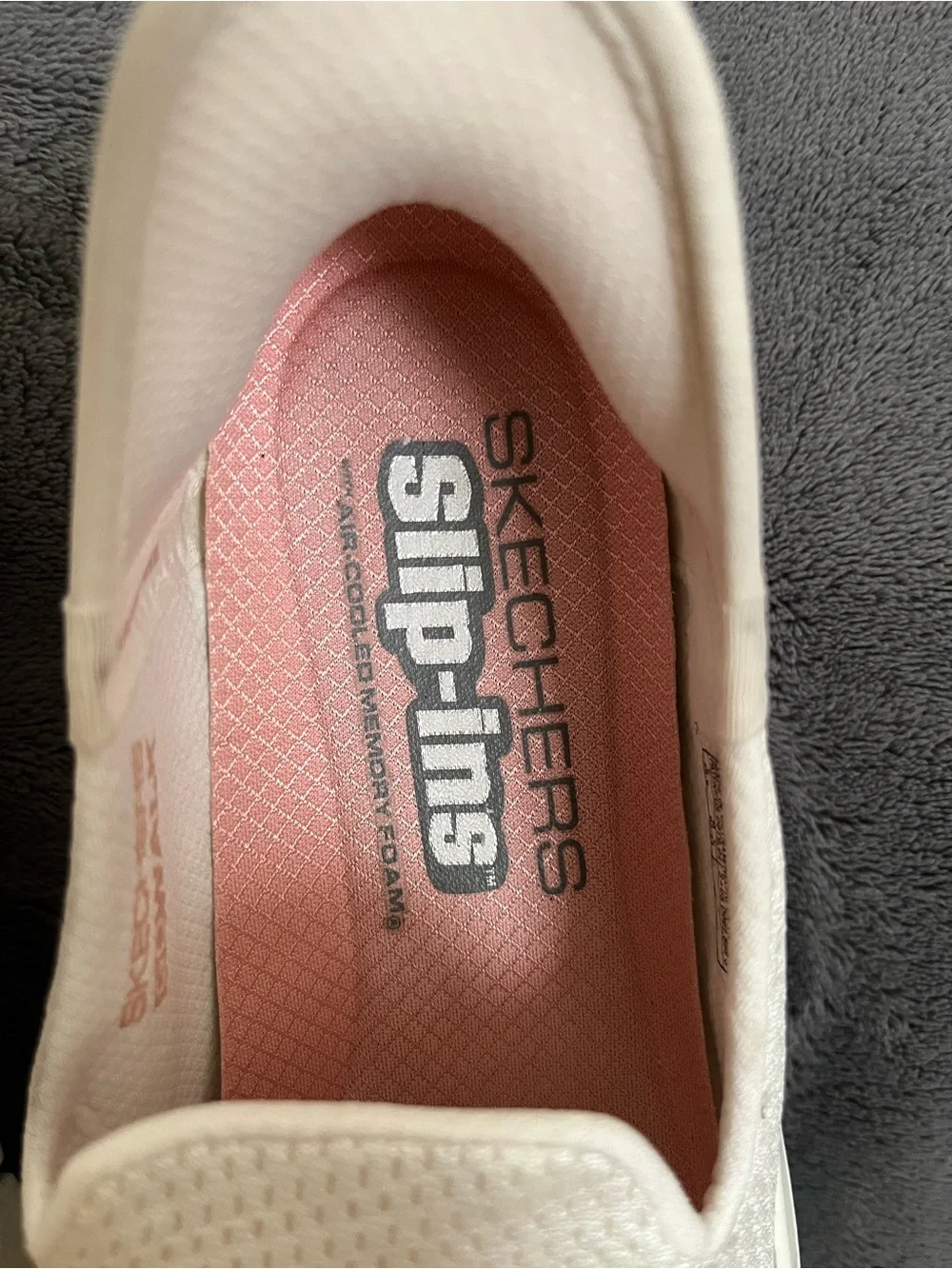 Skechers White Slip-On Sneakers with Pink Insole